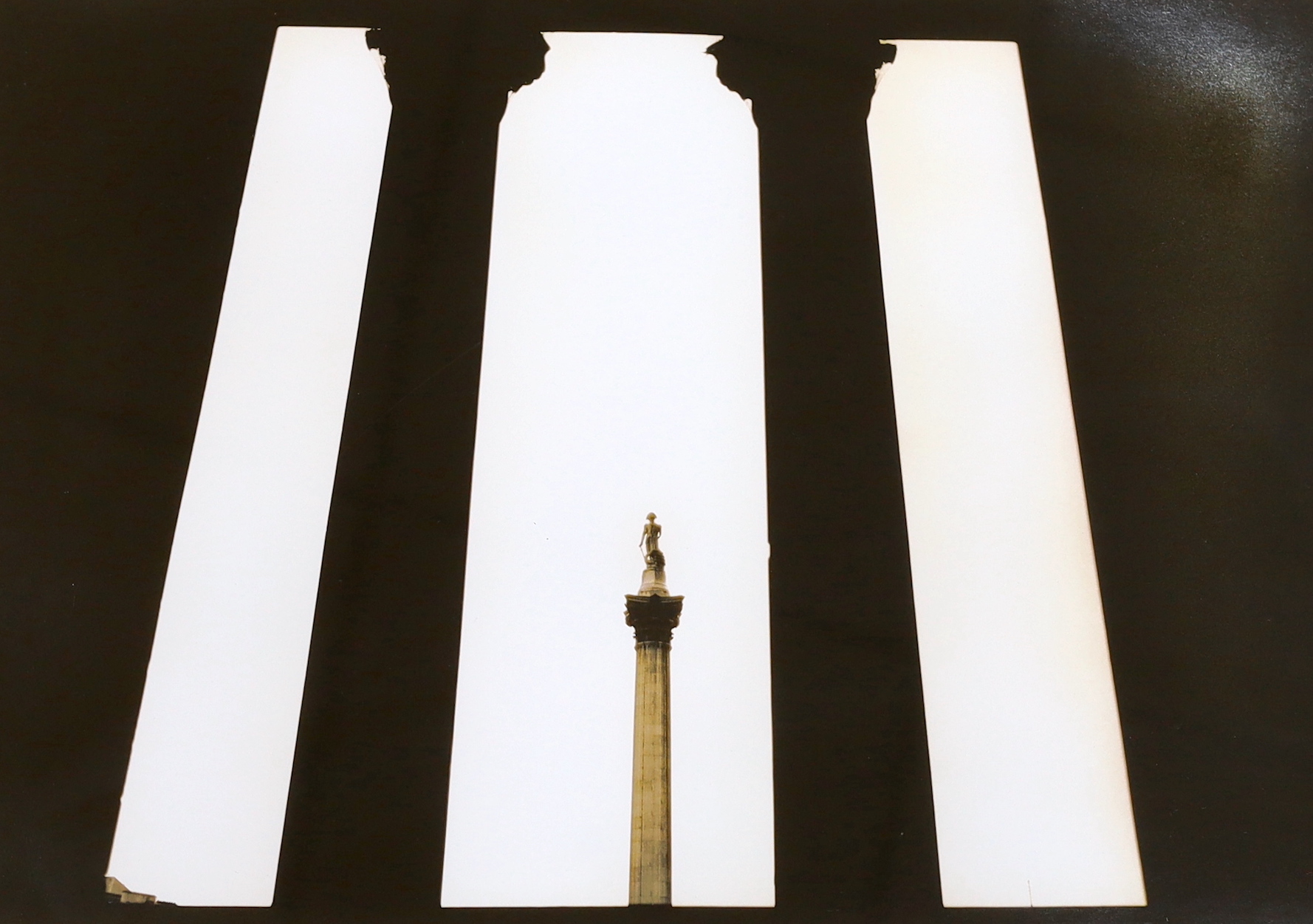 Marcus Davies (Contemporary), pair of gelatin prints, Canary Wharf, London 2001 and Nelson's Column, London, 2000, Davies and Tooth labels verso, 34 x 49cm
